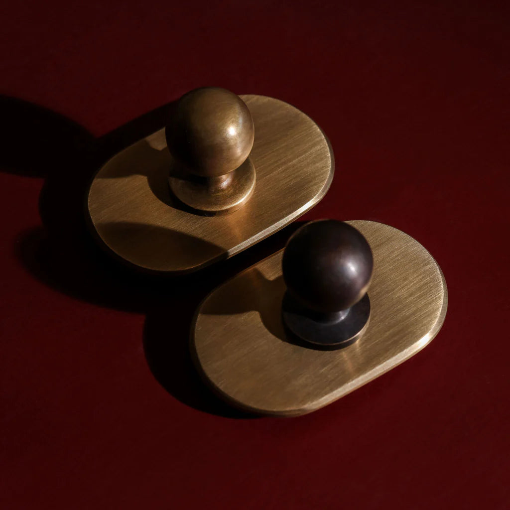 Curved Knob Backplate - Antique Bronze by Hepburn