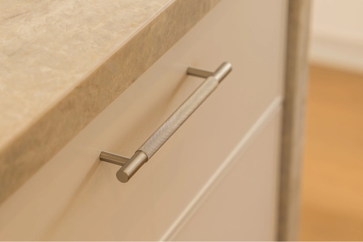 Manovella hardware in a finished home